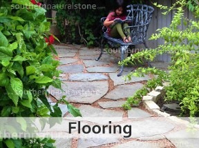 Stone flooring pathway with natural flagstone and greenery