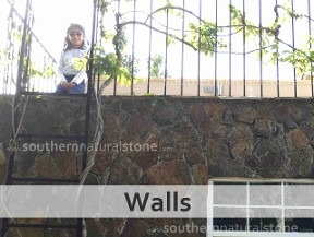Natural stone retaining wall installation