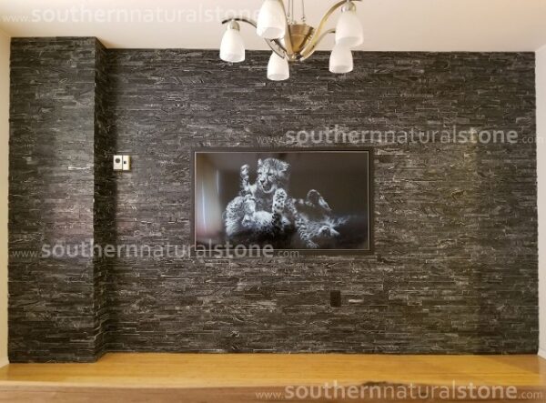 Glacial Black with a different painting on the wall