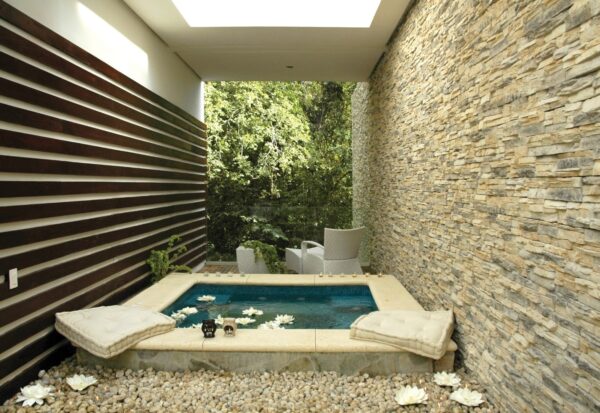 Alderwood walls with a pool